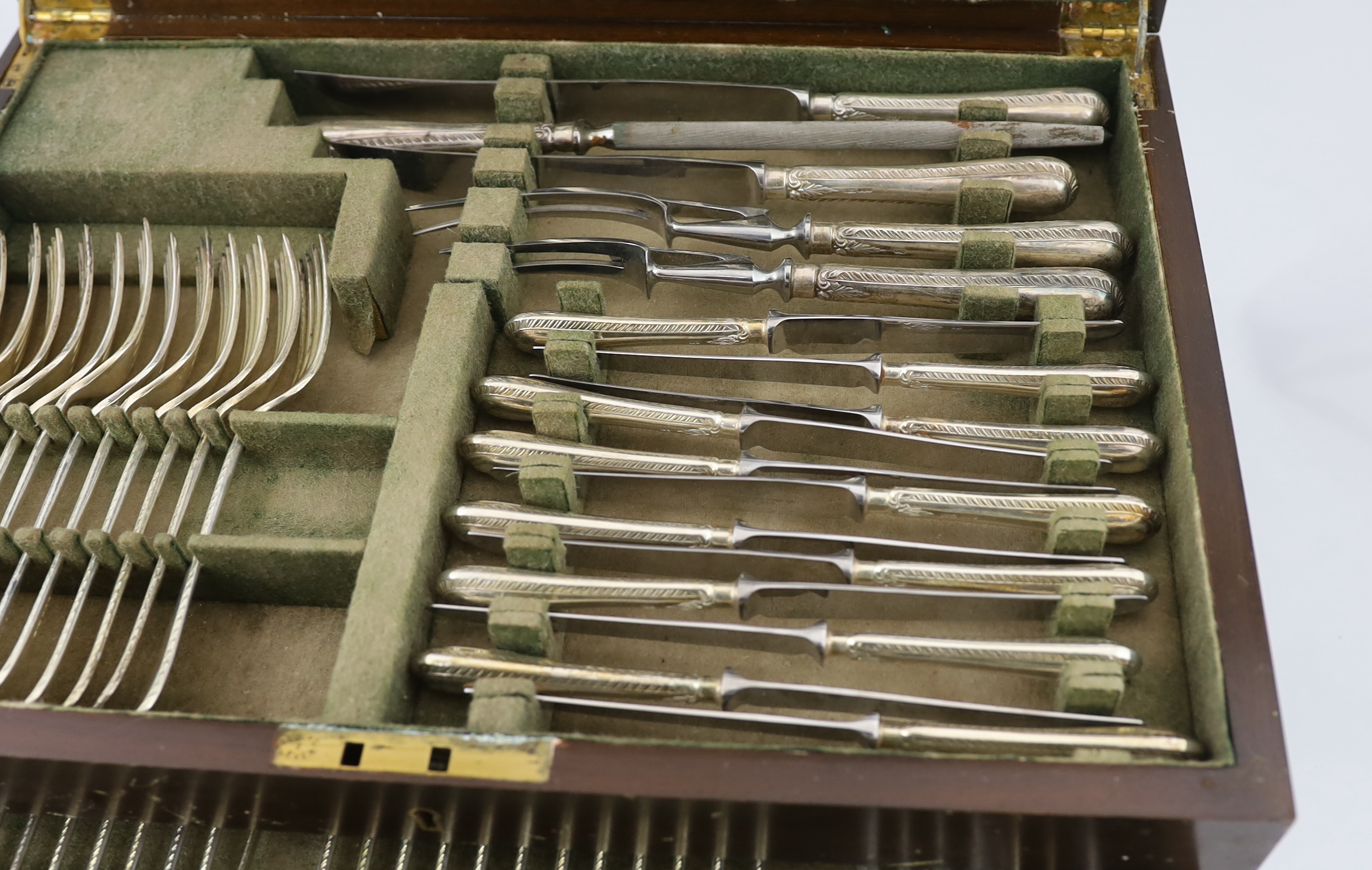 A modern complete canteen of Queen Elizabeth II silver Old English feather edge pattern cutlery for twelve, by James Dixon & Sons